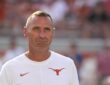 Texas Longhorns head coach Steve Sarkisian watches warmups on the field before facing Ohio State in Austin.