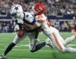 Kansas City Chiefs cornerback Trent McDuffie wraps up Dallas Cowboys wide receiver George Pickens as the ball pops loose.