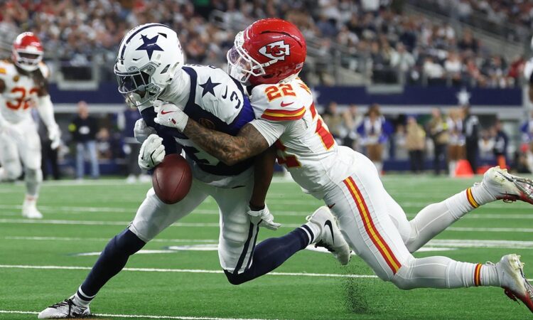 Kansas City Chiefs cornerback Trent McDuffie wraps up Dallas Cowboys wide receiver George Pickens as the ball pops loose.