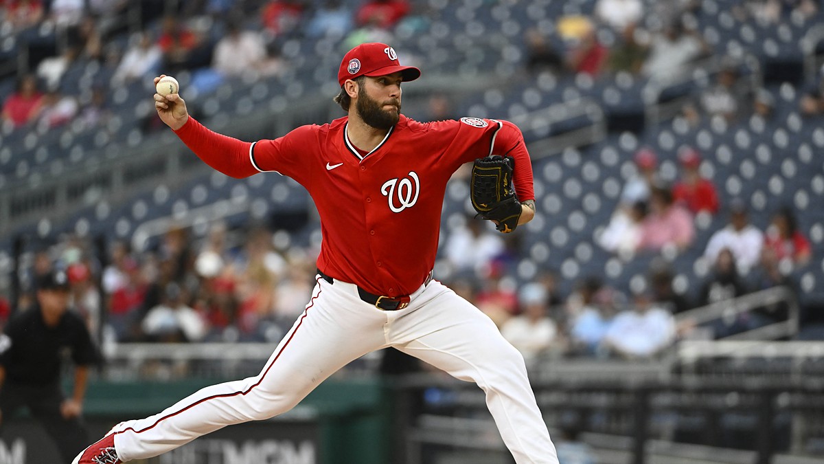 Washington Nationals starting pitcher Trevor Williams throws in his red home uniform at Nationals Park.