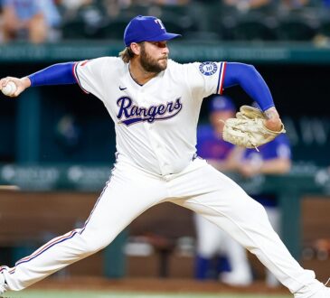 Texas Rangers right-hander Trevor Williams, No. 51, delivers a pitch from the mound at Globe Life Field.