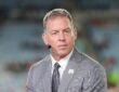 Troy Aikman wears a headset microphone at the broadcast position before the Bengals and Jaguars game.