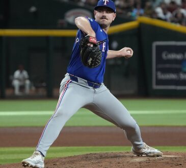 Texas Rangers pitcher Tyler Alexander delivers a pitch from the mound against Arizona at Chase Field.