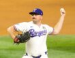 Rangers pitcher Tyler Alexander raises the ball behind him as he drives toward the plate.