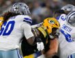Dallas Cowboys offensive tackle Tyler Guyton blocks a Green Bay pass rusher at the line of scrimmage.