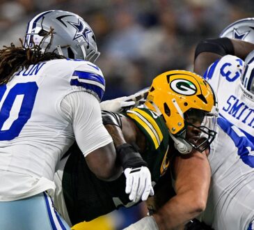 Dallas Cowboys offensive tackle Tyler Guyton blocks a Green Bay pass rusher at the line of scrimmage.