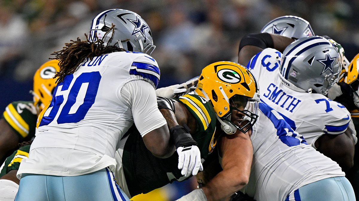 Dallas Cowboys offensive tackle Tyler Guyton blocks a Green Bay pass rusher at the line of scrimmage.