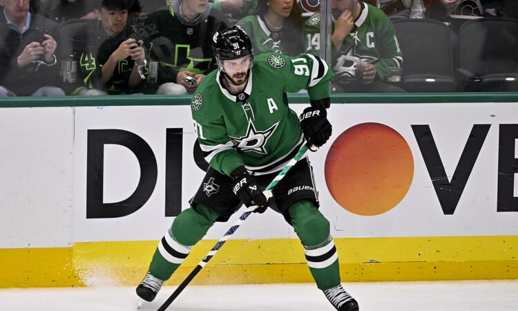 Dallas Stars center Tyler Seguin skates with his stick down along the boards during a playoff game against the Colorado Avalanche.