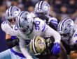 Dallas Cowboys linebacker Tyrus Wheat wraps up New Orleans Saints running back CJ Donaldson as teammates converge.
