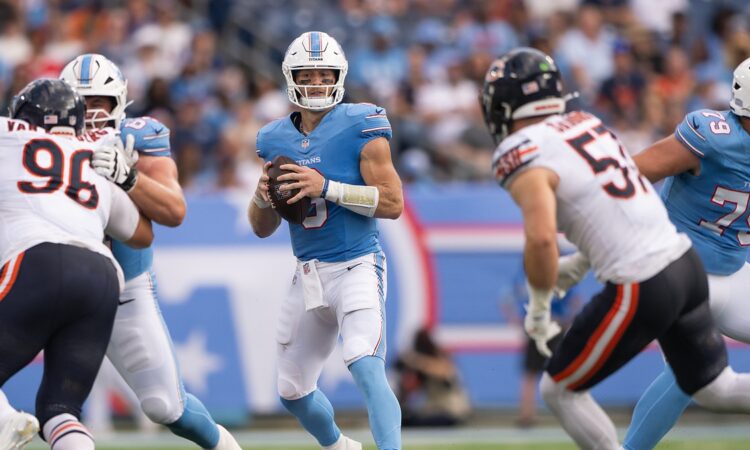 Tennessee Titans quarterback Will Levis looks downfield from the pocket during a preseason game at Nissan Stadium.
