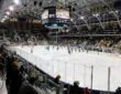 A wide view of Yost Ice Arena during a Big Ten quarterfinal between Michigan and Michigan State.