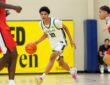 JL3 guard Abdul-Malik Olajuwon dribbles up the court as a Drive Nation defender closes in.