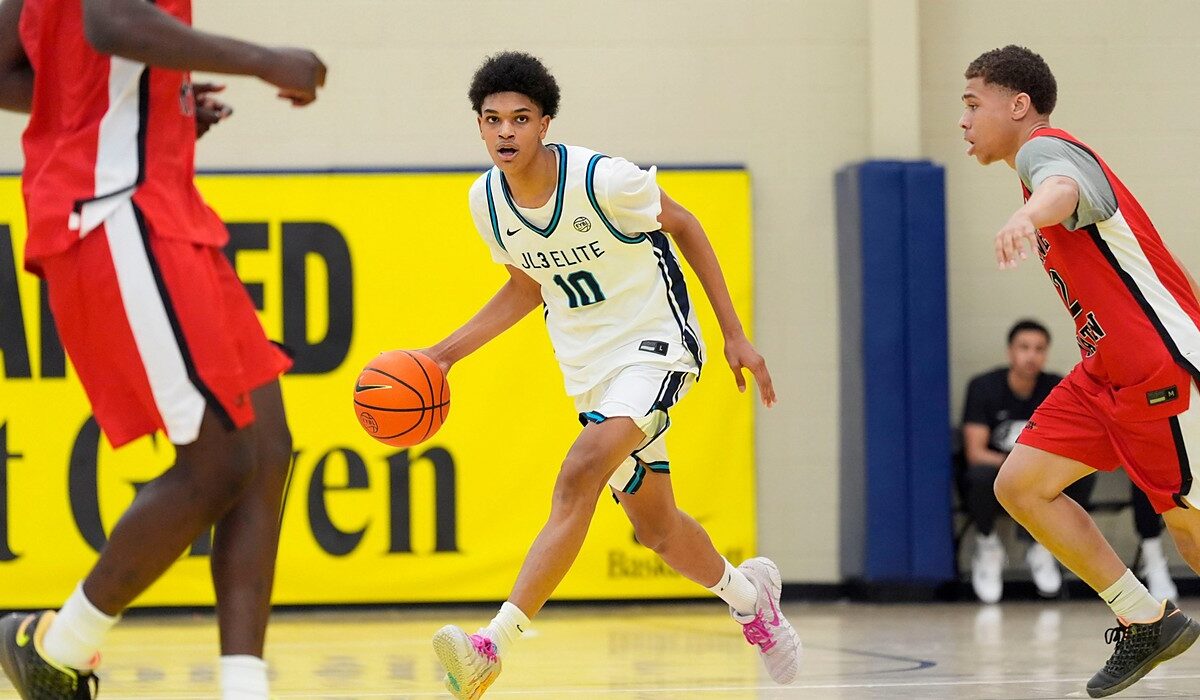 JL3 guard Abdul-Malik Olajuwon dribbles up the court as a Drive Nation defender closes in.
