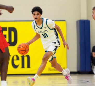 JL3 guard Abdul-Malik Olajuwon dribbles up the court as a Drive Nation defender closes in.