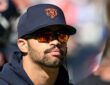 Chicago Bears quarterback Caleb Williams #18 walks on the sideline against the New York Jets at Soldier Field.