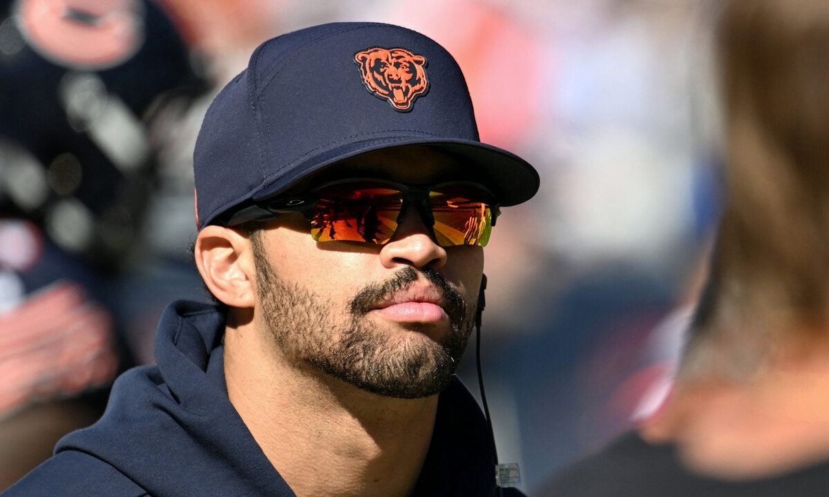 Chicago Bears quarterback Caleb Williams #18 walks on the sideline against the New York Jets at Soldier Field.