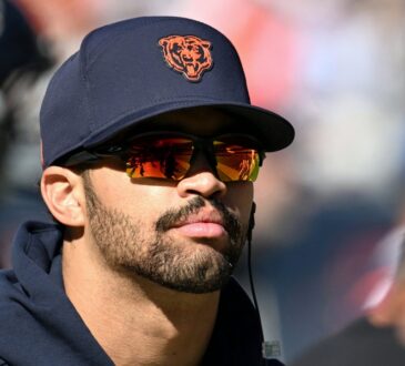 Chicago Bears quarterback Caleb Williams #18 walks on the sideline against the New York Jets at Soldier Field.