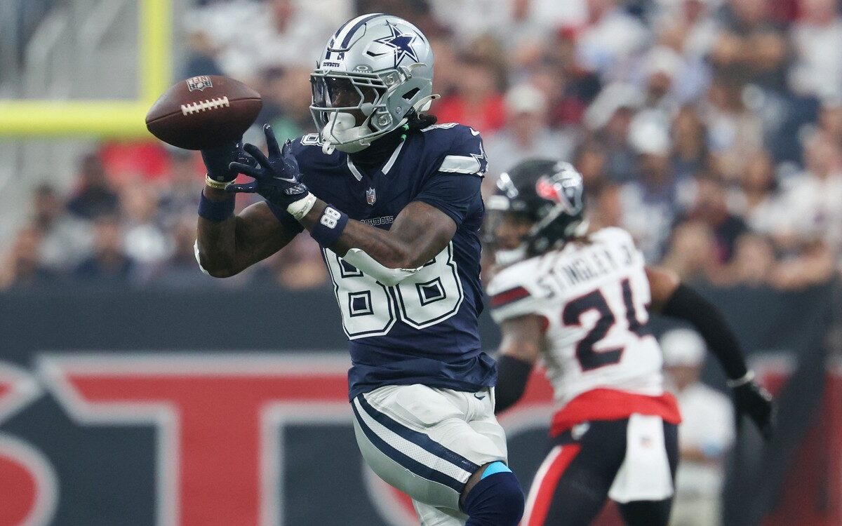 Dallas Cowboys wide receiver CeeDee Lamb (88) catching a football against the Houston Texans at Reliant Stadium in Houston, Texas.