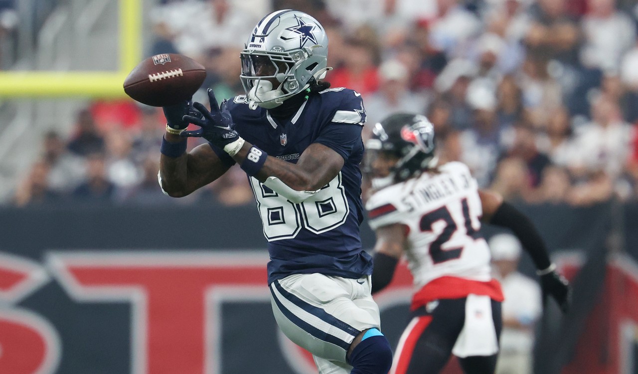 Dallas Cowboys wide receiver CeeDee Lamb (88) catching a football against the Houston Texans at Reliant Stadium in Houston, Texas.