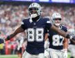 Dallas Cowboys wide receiver CeeDee Lamb (88) celebrates after scoring a fourth-quarter touchdown against the Houston Texans at Reliant Stadium.