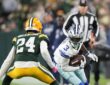 Dallas Cowboys wide receiver George Pickens cuts upfield with the ball as Green Bay Packers cornerback Carrington Valentine squares up.