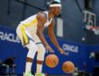 Golden State Warriors forward Jimmy Butler III #10 dribbles two basketballs during NBA Media Day at Chase Center.