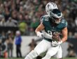 Dallas Cowboys cornerback Joey Porter Jr. wraps up Philadelphia Eagles tight end Dallas Goedert from behind.