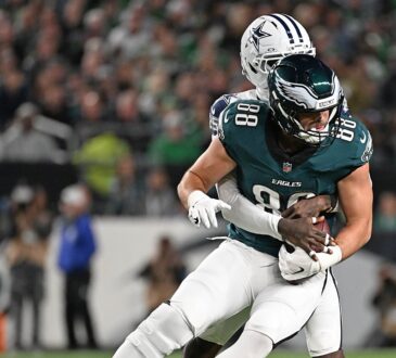 Dallas Cowboys cornerback Joey Porter Jr. wraps up Philadelphia Eagles tight end Dallas Goedert from behind.
