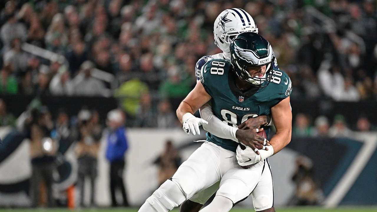 Dallas Cowboys cornerback Joey Porter Jr. wraps up Philadelphia Eagles tight end Dallas Goedert from behind.