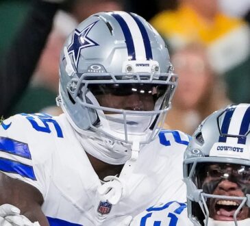 Dallas Cowboys cornerback Joey Porter Jr. joins the celebration as linebacker Dee Winters yells in front of him.