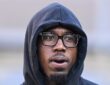 Pittsburgh Steelers cornerback Joey Porter Jr. stands in a hooded team sweatshirt and glasses.