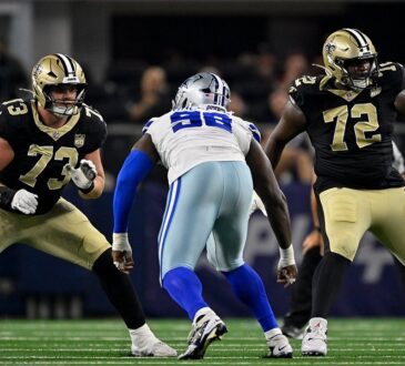 Dallas Cowboys defensive tackle Jonathan Bullard squares up between two New Orleans Saints offensive tackles in pass protection.
