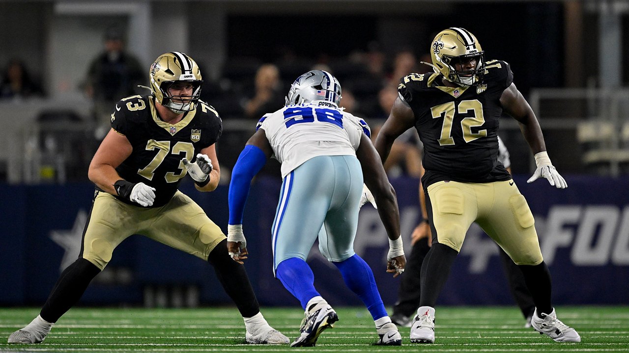 Dallas Cowboys defensive tackle Jonathan Bullard squares up between two New Orleans Saints offensive tackles in pass protection.