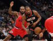 Los Angeles Clippers forward Kawhi Leonard and guard James Harden force Houston Rockets forward Kevin Durant to turn the ball over at Intuit Dome.