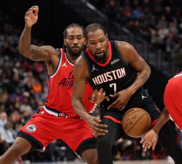 Los Angeles Clippers forward Kawhi Leonard and guard James Harden force Houston Rockets forward Kevin Durant to turn the ball over at Intuit Dome.