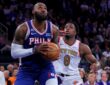Philadelphia 76ers forward LeBron James #23 looks to shoot against New York Knicks forward OG Anunoby #8 at Madison Square Garden.