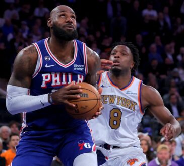 Philadelphia 76ers forward LeBron James #23 looks to shoot against New York Knicks forward OG Anunoby #8 at Madison Square Garden.