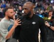 Los Angeles Lakers forward LeBron James #23 meets with Golden State Warriors guard Stephen Curry #30 after a game at Chase Center.
