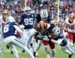 Dallas Cowboys linebacker Marist Liufau and safety Malik Hooker wrap up Washington Commanders running back Jacory Croskey-Merritt.