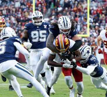 Dallas Cowboys linebacker Marist Liufau and safety Malik Hooker wrap up Washington Commanders running back Jacory Croskey-Merritt.