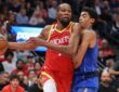 Houston Rockets forward Kevin Durant drives with the ball in his right hand as Dallas Mavericks guard Max Christie defends him.