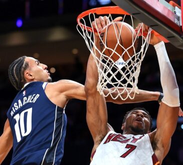 Miami Heat forward Giannis Antetokounmpo (7) dunks against Dallas Mavericks forward Zaccharie Risacher (10) during the first quarter at Kaseya Center on Oct. 26, 2026.