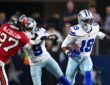 Dallas Cowboys wide receiver Ryan Flournoy carries the ball as teammate KaVontae Turpin blocks Tampa Bay Buccaneers cornerback Zyon McCollum.