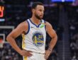 Golden State Warriors guard Stephen Curry #30 looks on during first-half action against the Sacramento Kings at Chase Center.