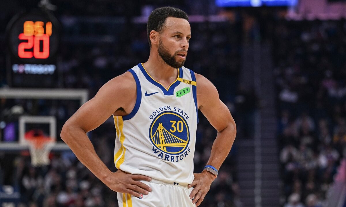 Golden State Warriors guard Stephen Curry #30 looks on during first-half action against the Sacramento Kings at Chase Center.