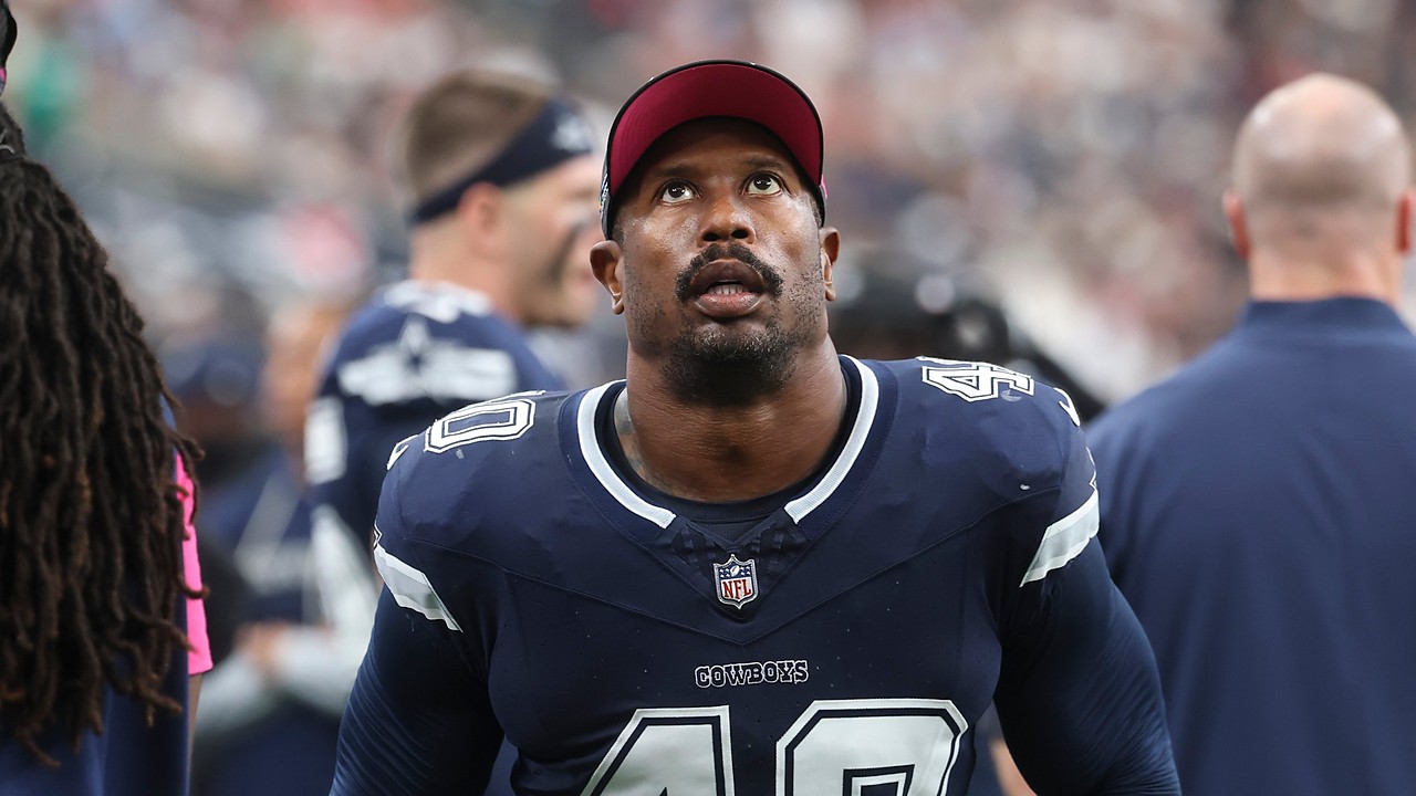 Cowboys outside linebacker Von Miller looks up from the sideline.
