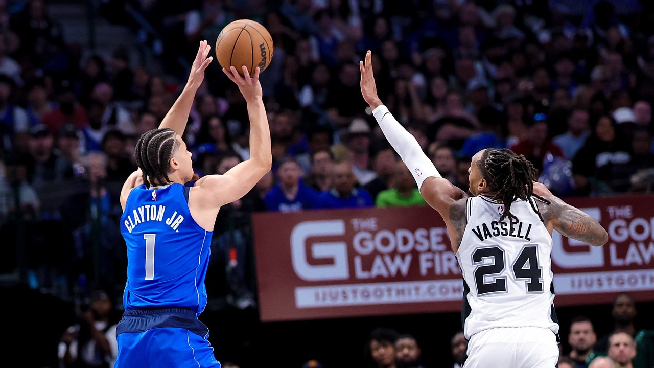 Dallas Mavericks Guard Walter Clayton Jr. Shoots Over Spurs Guard Devin Vassell