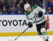 Stars center Wyatt Johnston follows through on a shot along the boards in Buffalo.