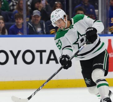 Stars center Wyatt Johnston follows through on a shot along the boards in Buffalo.